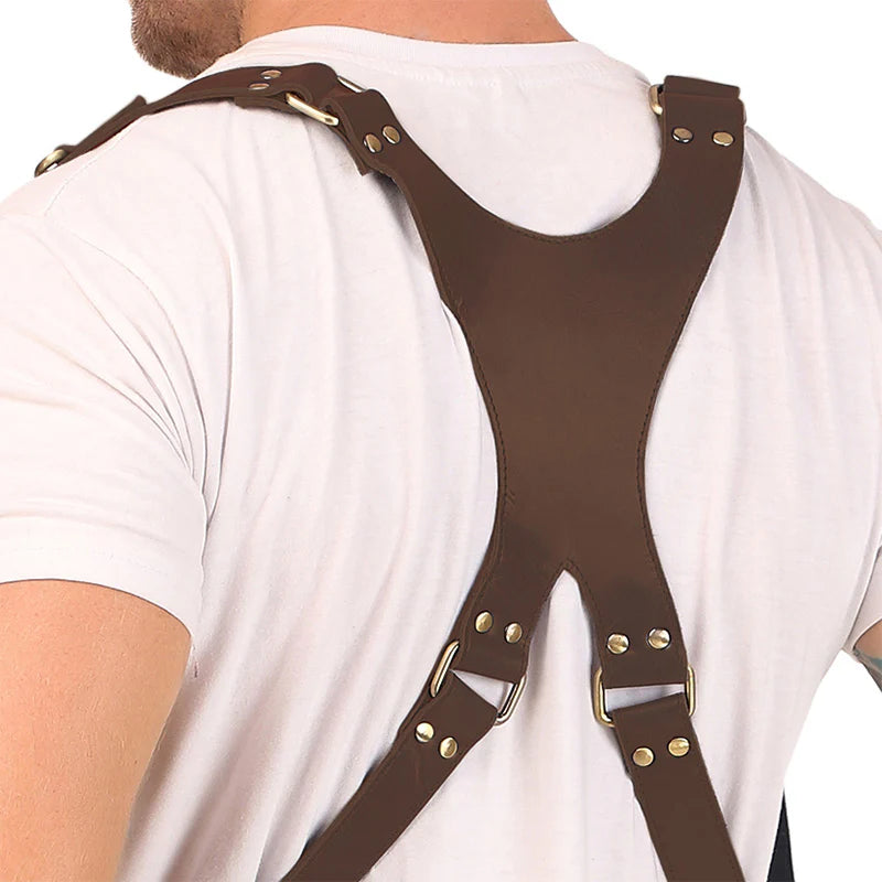 Brown leather suspenders worn by a person on a white background
