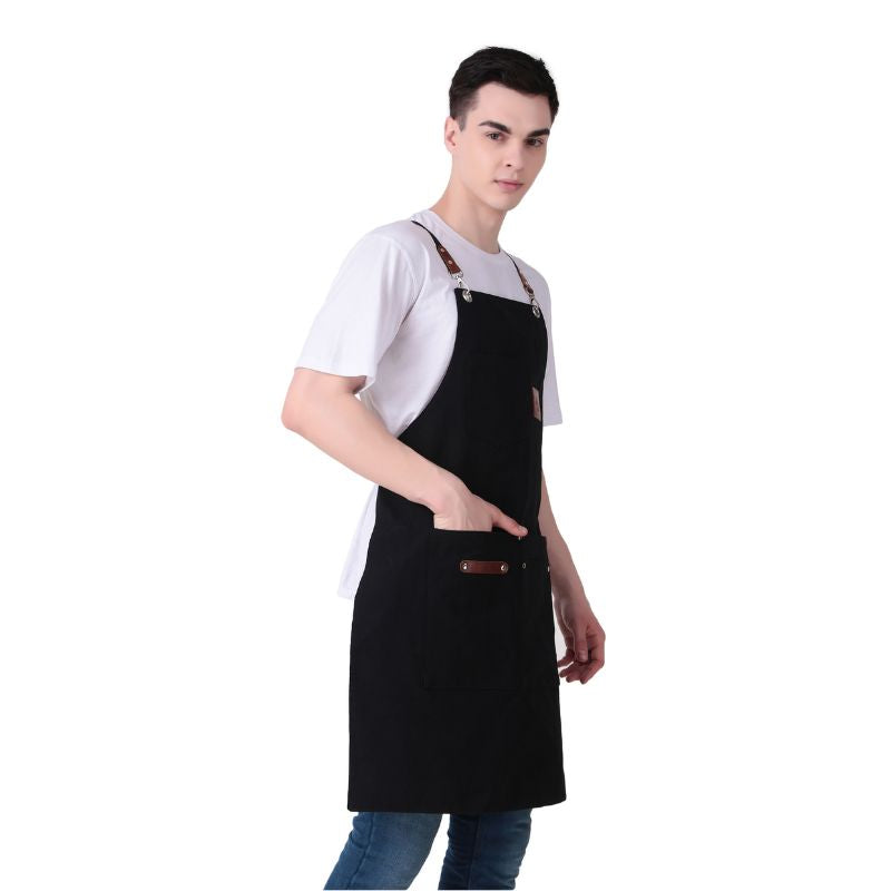 Person wearing a black apron on a white background