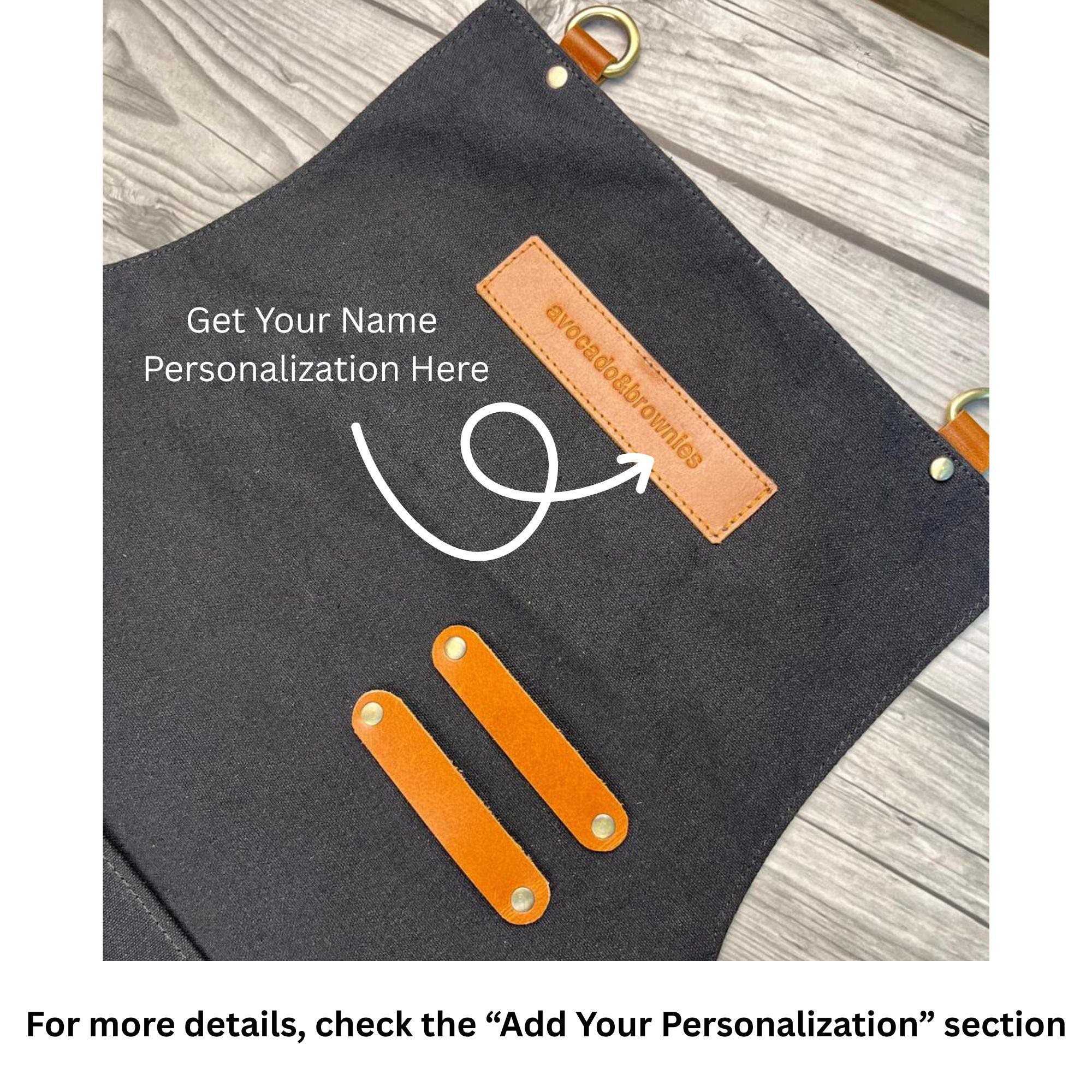 Black pouch with orange accents and customizable name tag on a wooden surface