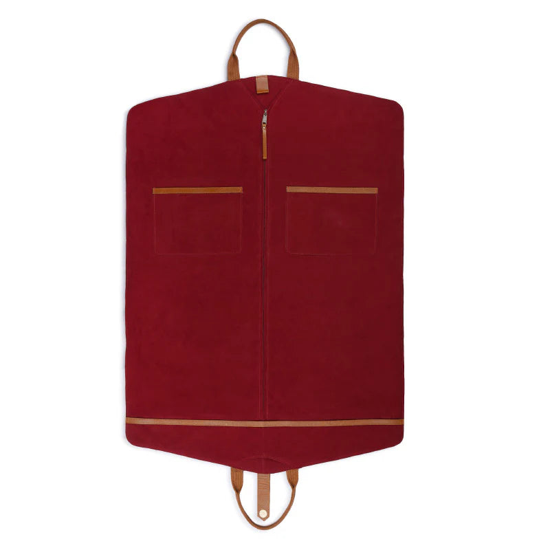 Red garment bag with brown accents on a white background