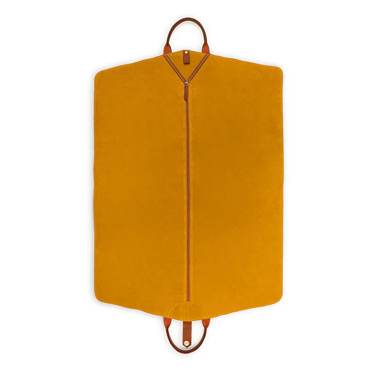 Yellow garment bag with brown handles on a white background