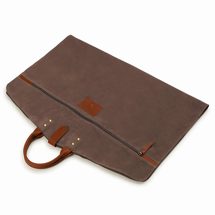 Brown leather briefcase with handle on a white background