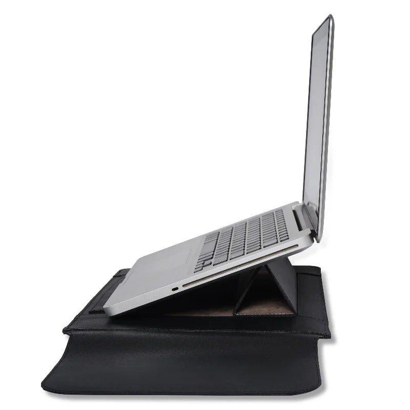 Laptop on a black standable sleeve with a white background