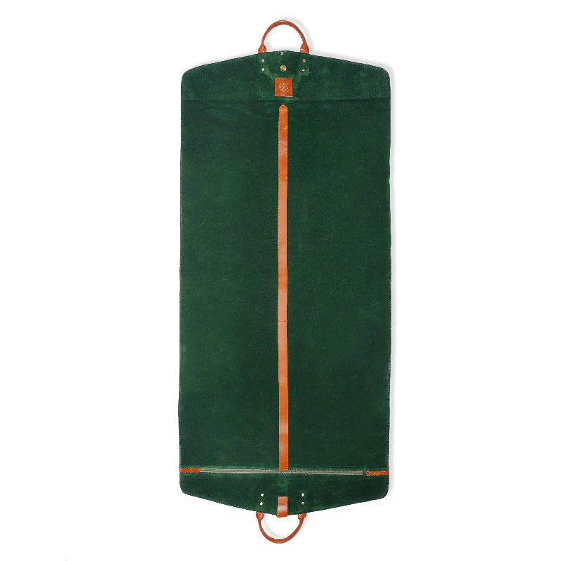Green garment bag with brown straps on a white background