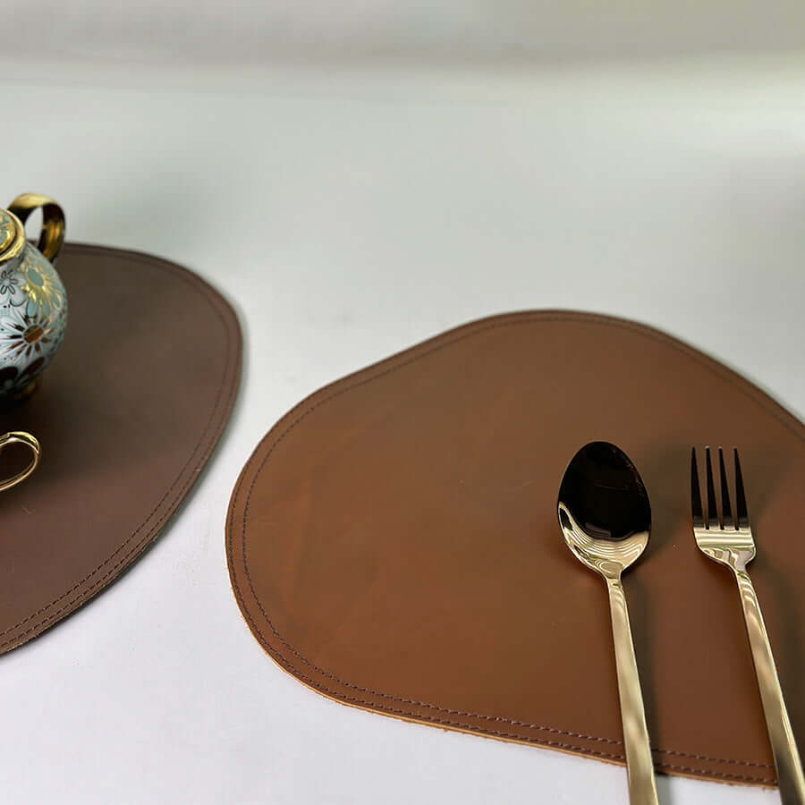 round leather dining table mat with spoon