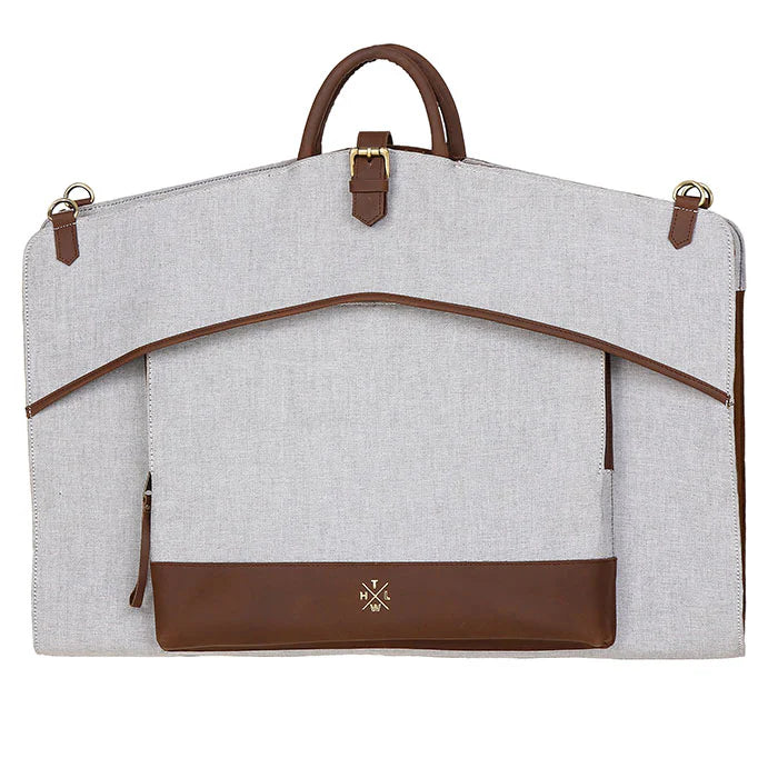 Gray garment bag with brown accents on a white background