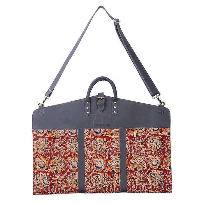 Bag with floral patterned front and plain gray back on a white background