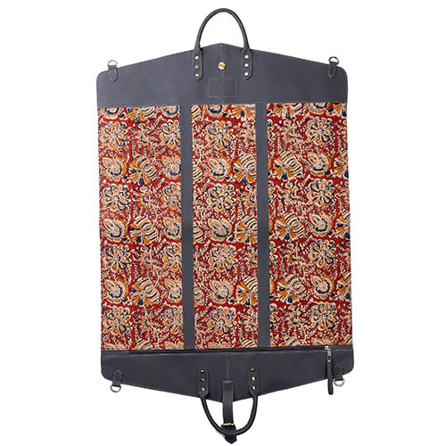 Garment bag with floral pattern and black straps on a white background