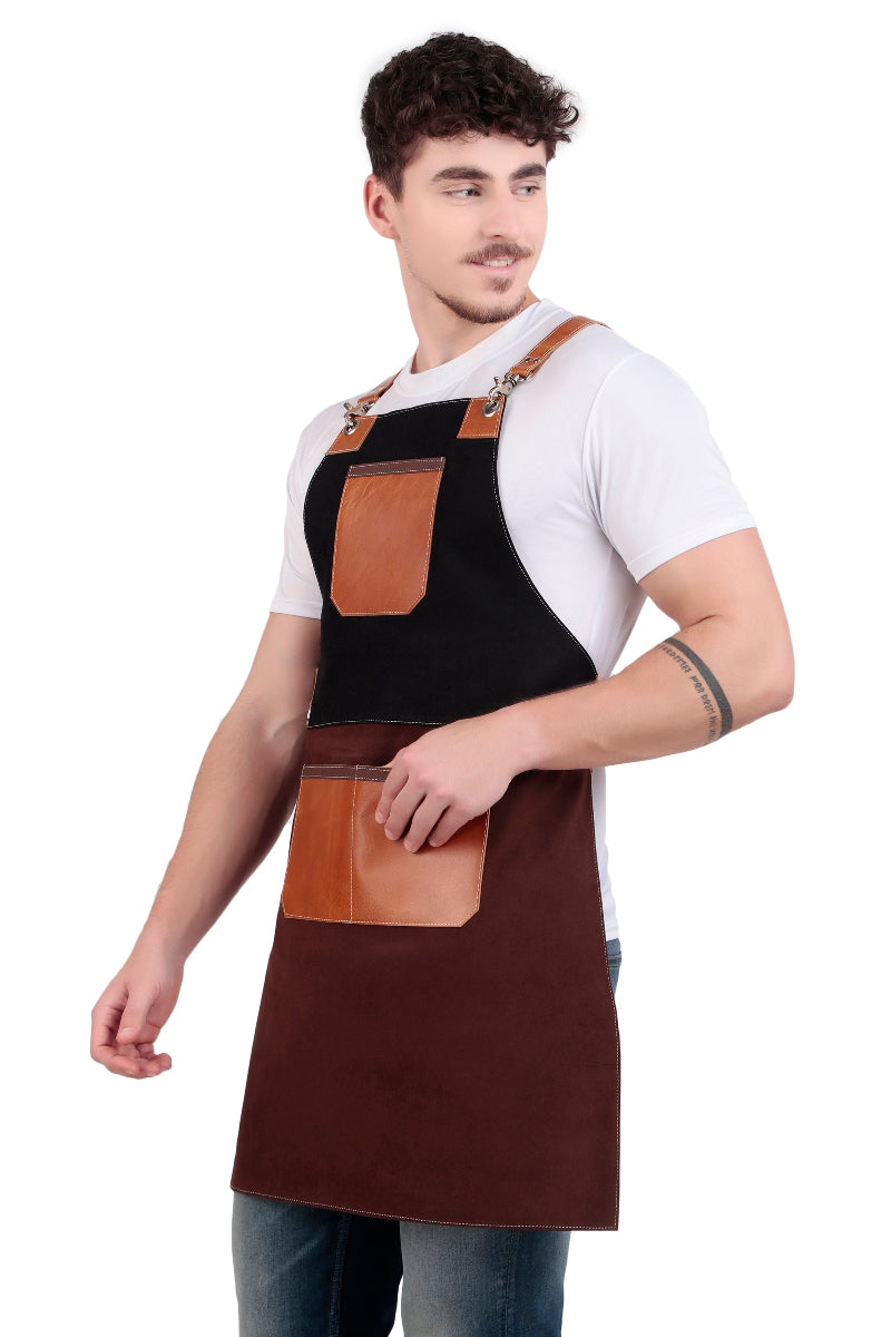Man wearing a black apron with brown leather pockets on a white background