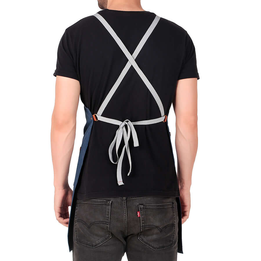 man cooking apron