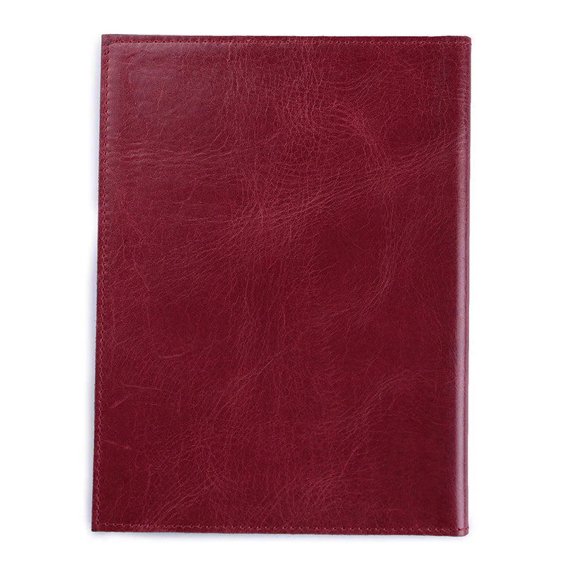 Red leather notebook on a white background