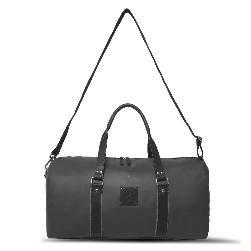 Black duffel bag with a strap on a white background