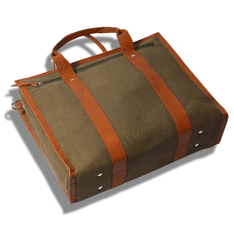 Brown leather-bound bag with a handle on a white background