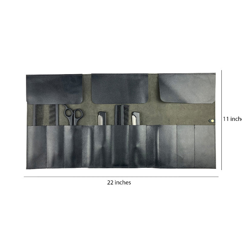 Black tool roll with compartments containing grooming tools on a white background