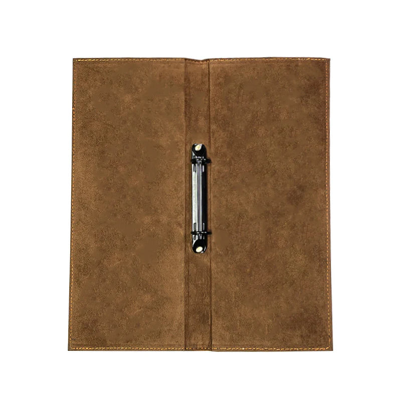 Brown leather menu cover with a silver clip on a white background