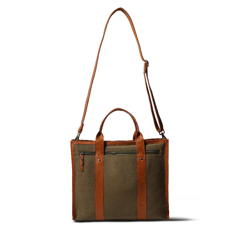 Brown tote bag with leather straps on a white background