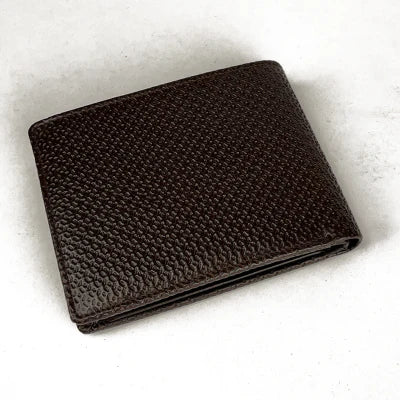 Brown leather wallet on a white background