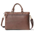 Brown leather briefcase with shoulder strap on a white background