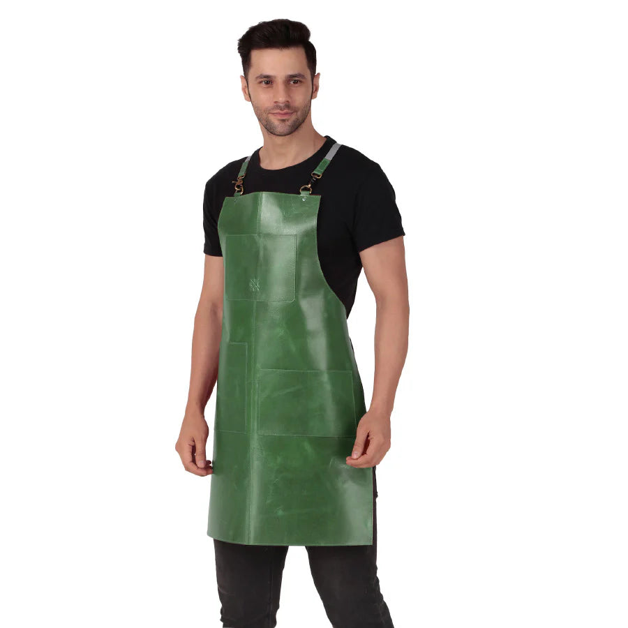 Man wearing a green apron on a white background