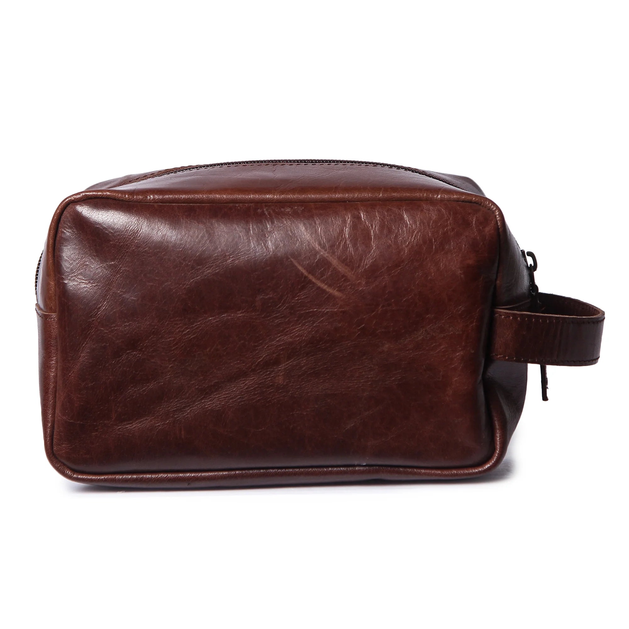 Brown leather toiletry bag on a white background