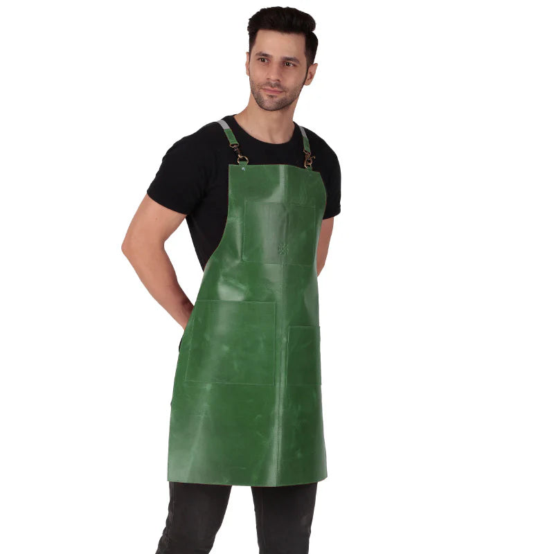 Man wearing a green apron on a white background