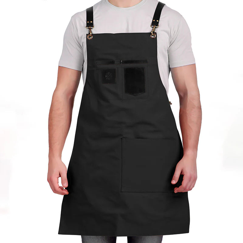 Person wearing a black apron on a white background