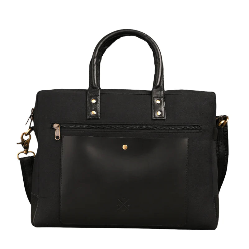 Black handbag with gold accents on a white background