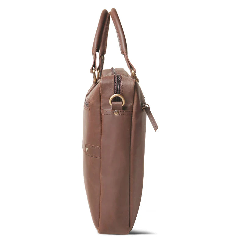 Brown leather bag with a handle on a white background