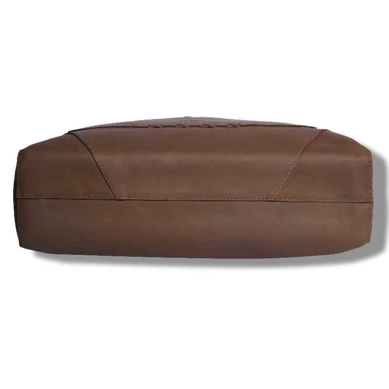 Brown leather bag on a white background