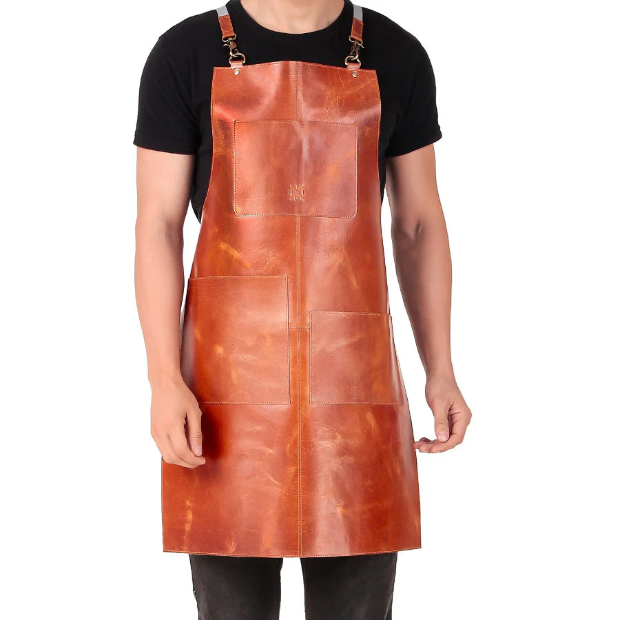 Person wearing a brown leather apron on a white background
