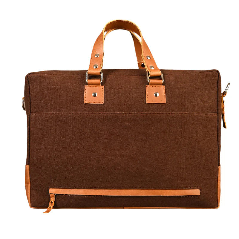 Brown bag with leather straps on a white background