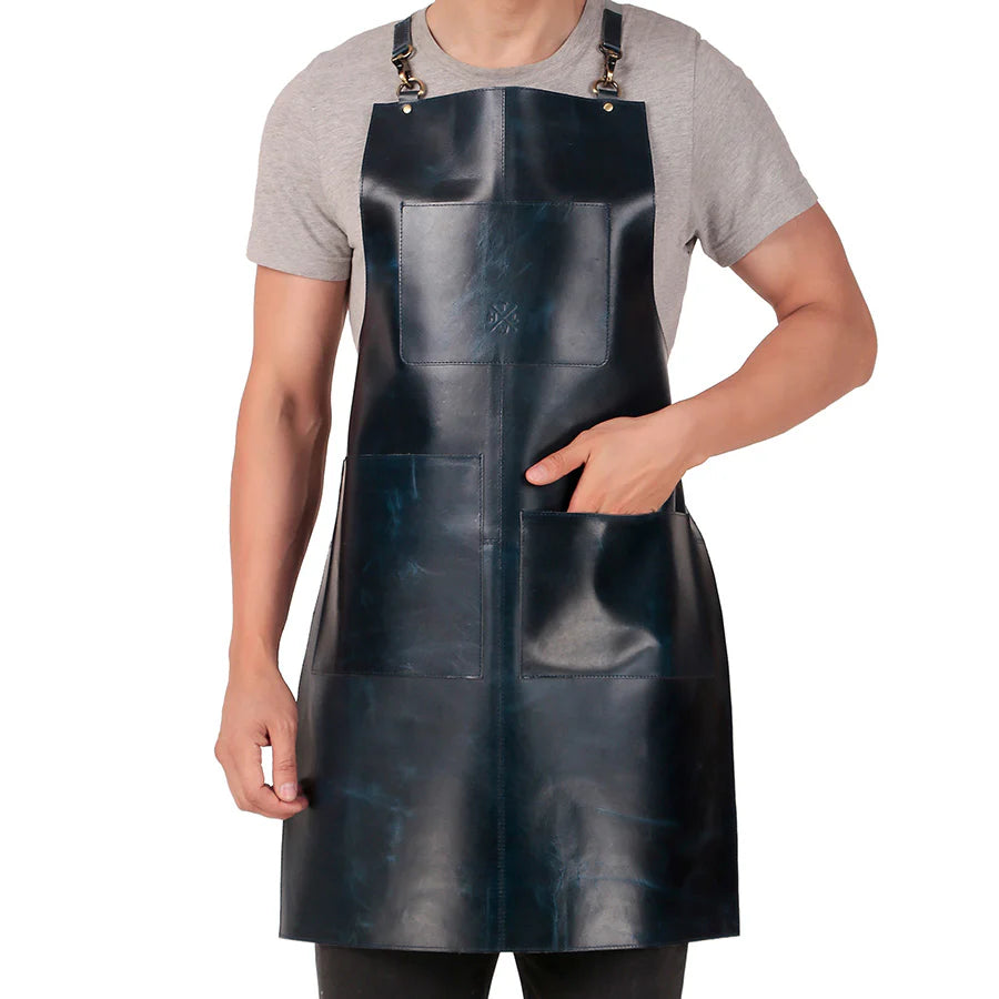 Person wearing a black leather apron on a white background