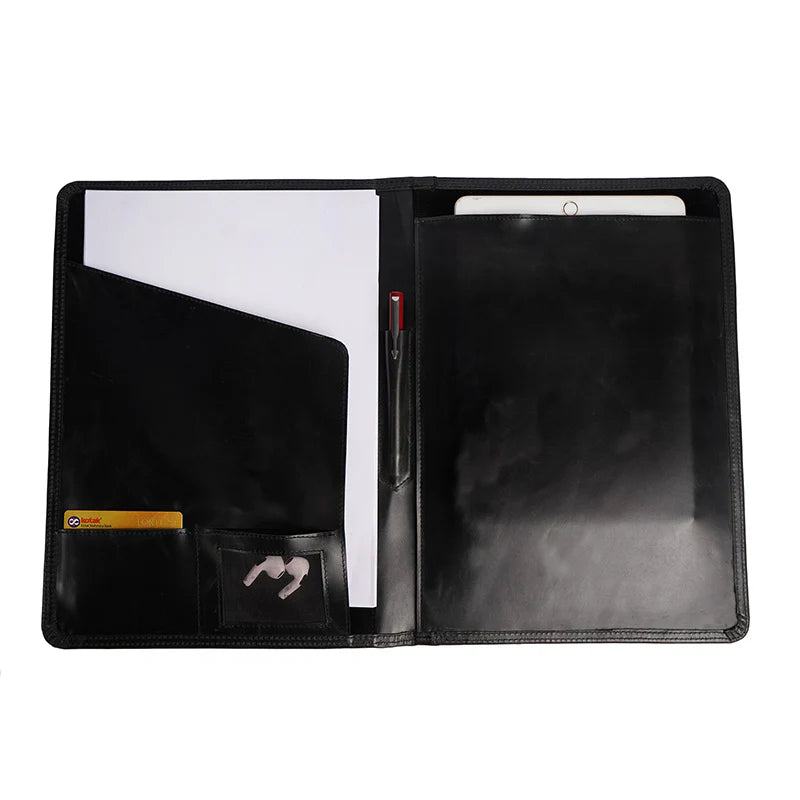Black leather folder with open compartments on a white background