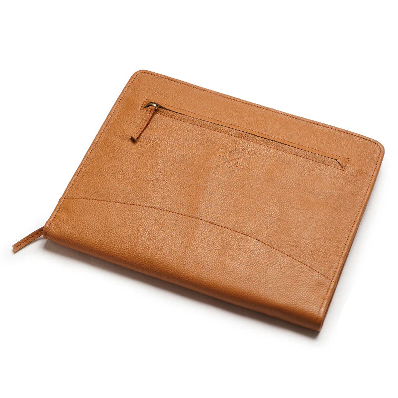 Brown leather pouch with a zipper on a white background