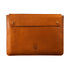 Brown leather laptop sleeve with a brand logo on a white background