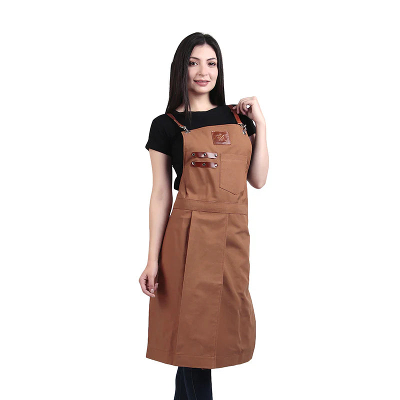 Woman wearing a brown apron on a white background