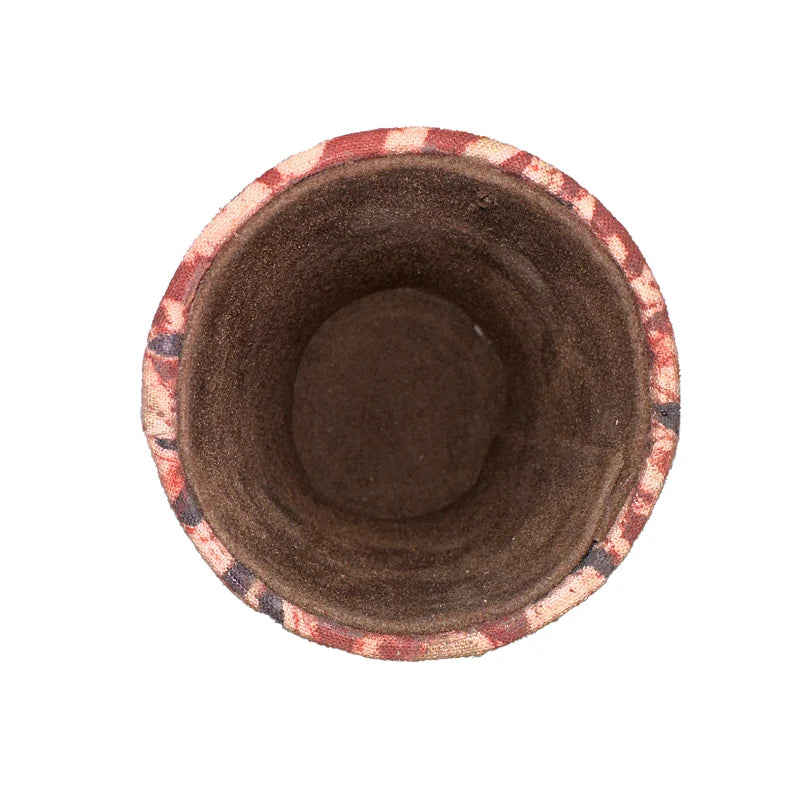 Top view of a cylindrical container with a textured surface on a white background