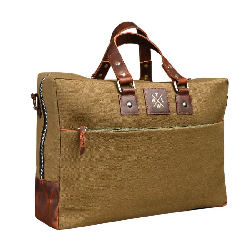 Brown leather briefcase with brown straps on a white background