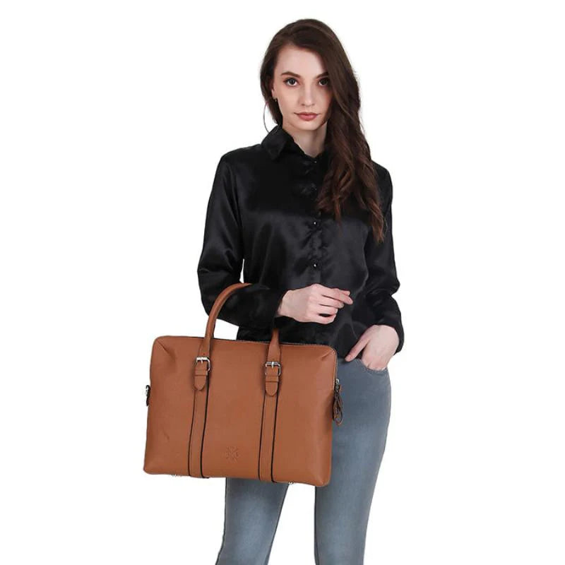 Woman holding a brown leather briefcase against a white background