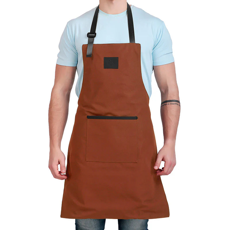 Person wearing a brown apron on a white background