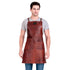 Man wearing a brown leather apron on a white background