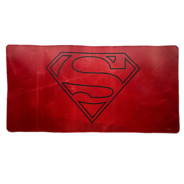 Red mouse pad with Superman logo on a white background