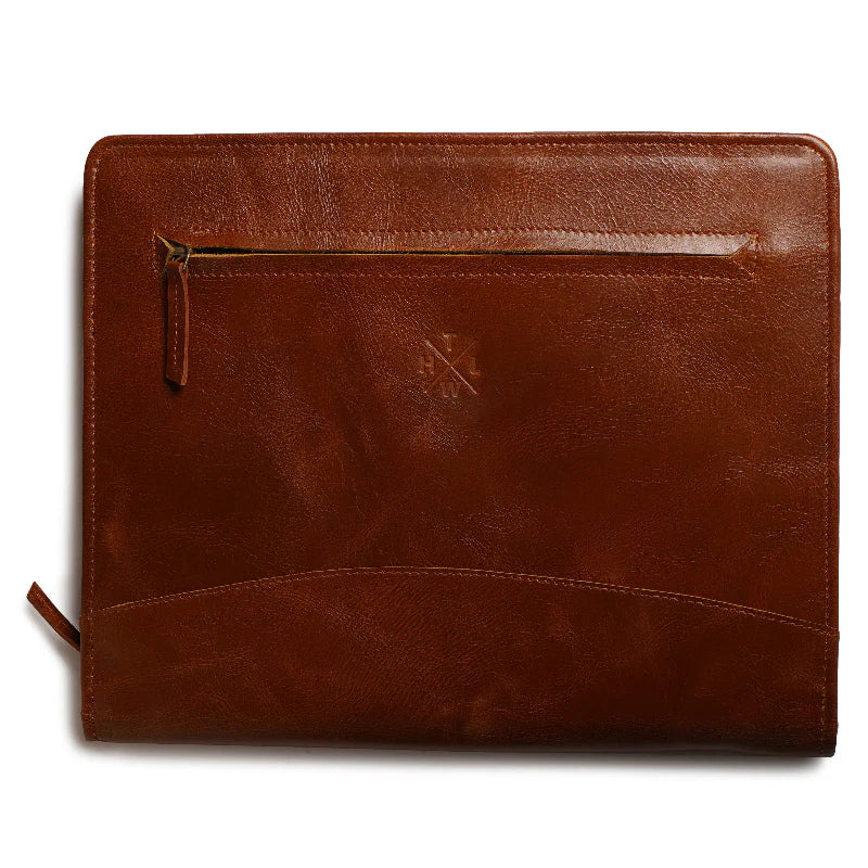 Brown leather folio with zipper on a white background