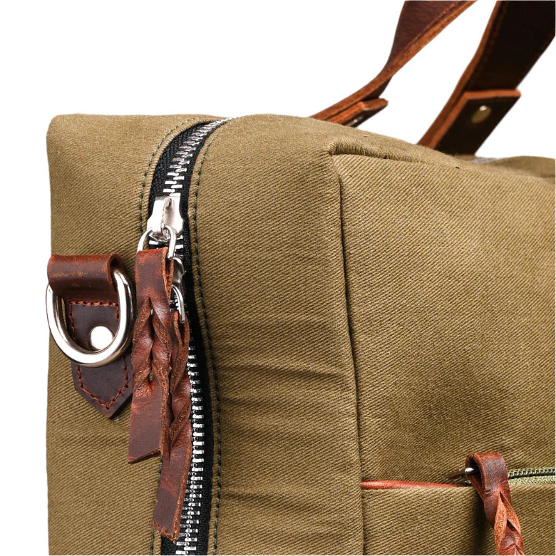 Brown leather bag with zipper and strap details on a white background