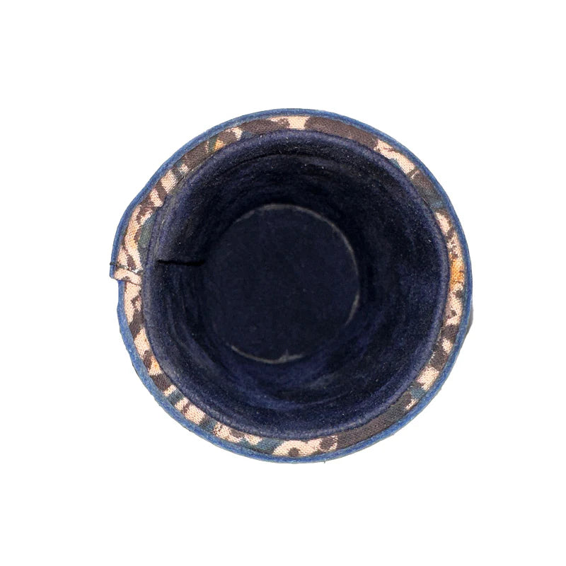 Navy blue velvet jewelry box with gold trim on a white background
