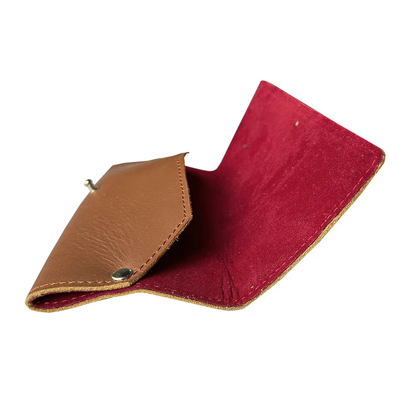 Red and brown leather wallet on a white background