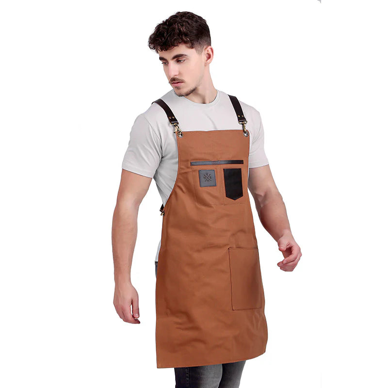 Man wearing a brown apron on a white background