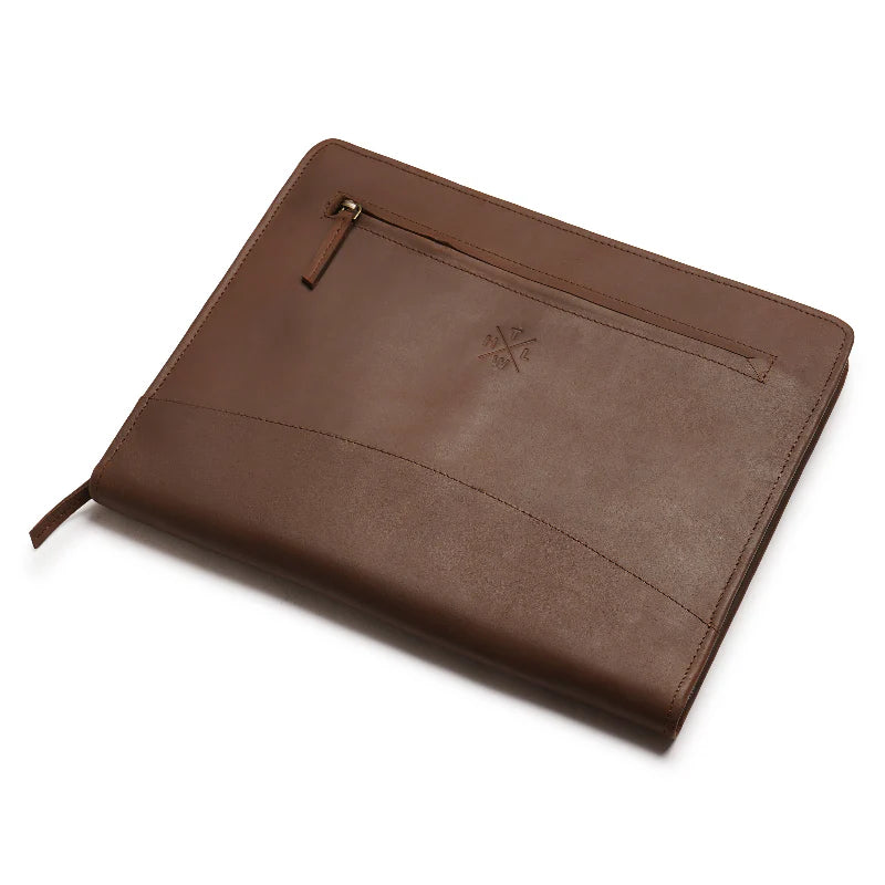 Brown leather pouch with a zipper on a white background