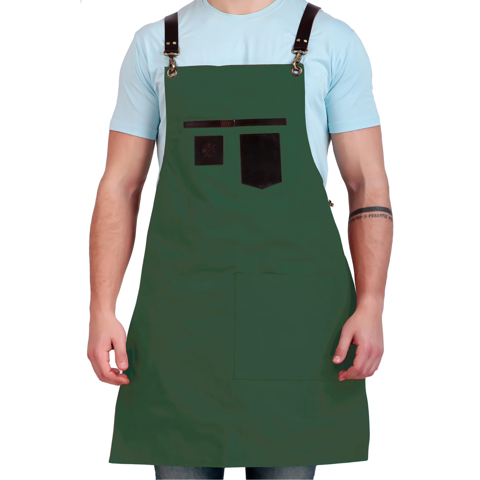 Person wearing a green apron with brown straps on a white background