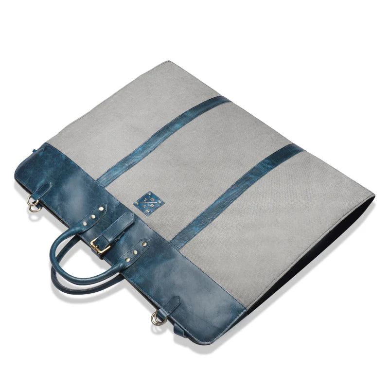 Gray and blue leather briefcase on a white background